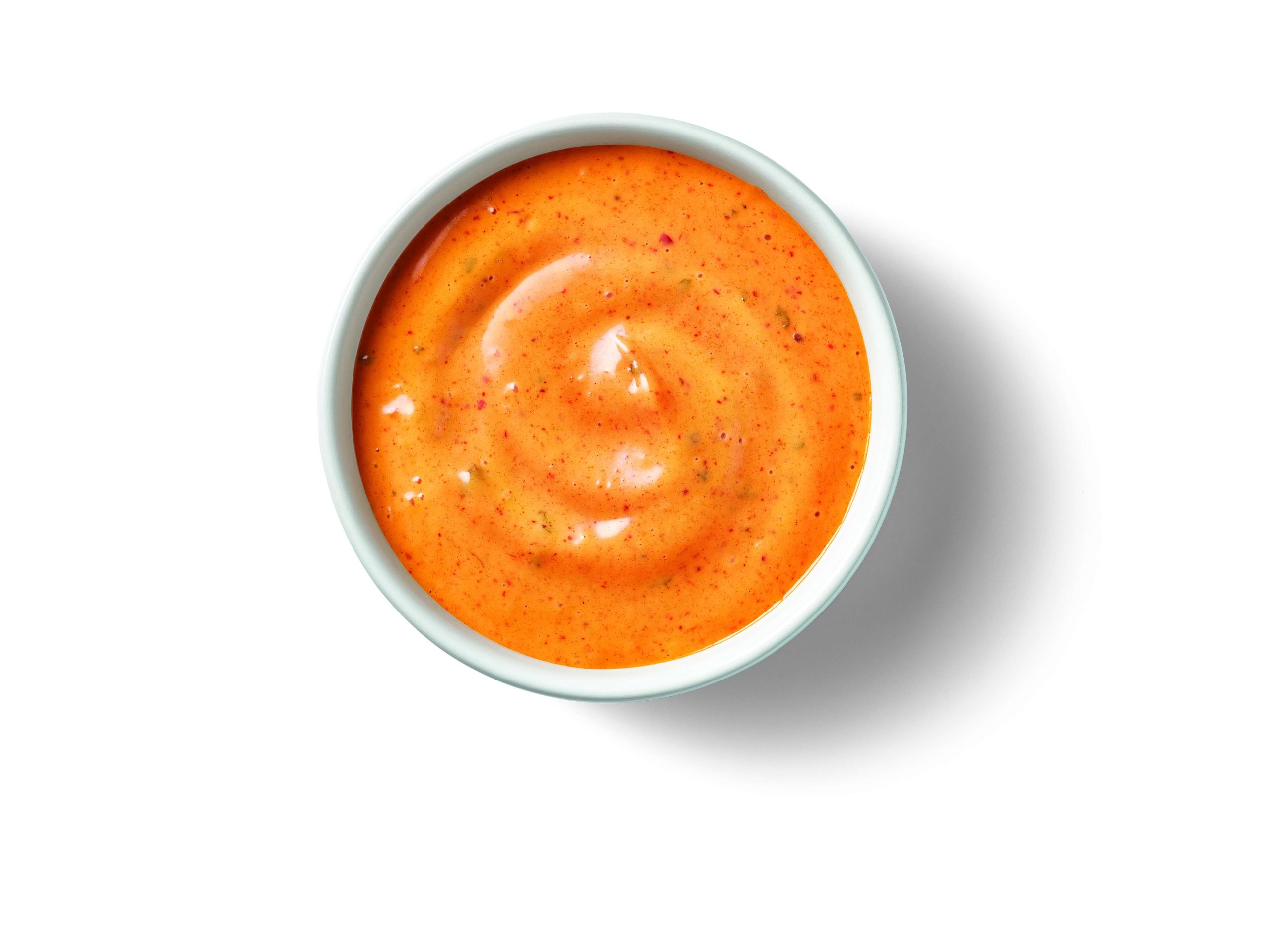 Image of Baja Chipotle Sauce in a small white sauce dish